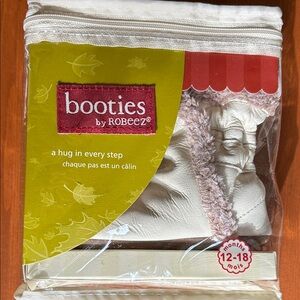Robeez Cream Baby Booties with Pink Trim